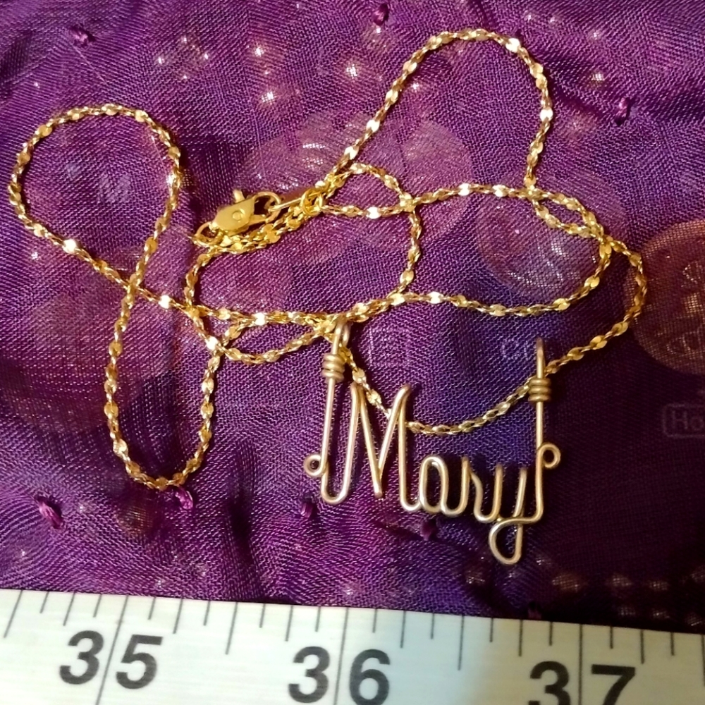 Mary necklace.